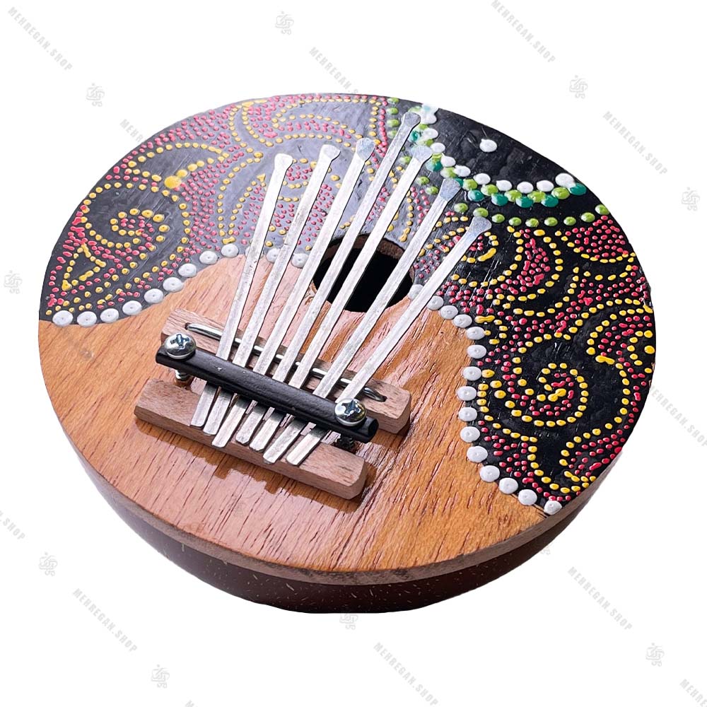 ساز آفریقایی کالیمبا مدل پوست نارگیل هفت تیغه ساز آفریقایی کالیمبا مدل پوست نارگیل هفت تیغه