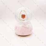 گوی موزیکال برفی مدل فرشته نگهبان نشسته