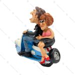 مجسمه مرد و زن موتور سوار