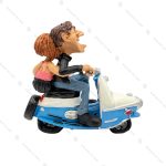 مجسمه مرد و زن موتور سوار